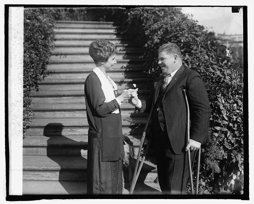 Leo B. Clark presents Forget-Me-Not to Mrs. Coolidge, 10/23/24