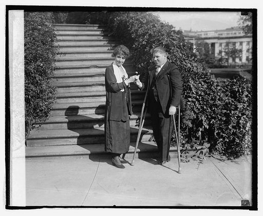 Leo B. Clark presents Forget-Me-Not to Mrs. Coolidge, [10/23/24