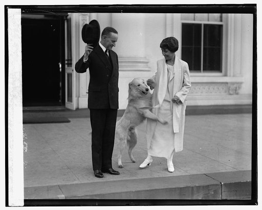 Pres. & Mrs. Coolidge acknowledge greetings from crowd, 11/5/24