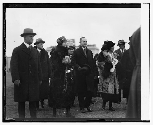 Pres. & Mrs. Coolidge arriving at Army-Navy game, [11/29/24