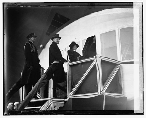 Mrs. Coolidge christening "Los Angeles" with Pres. Coolidge and Capt. A.A. Andrews, [11/25/24