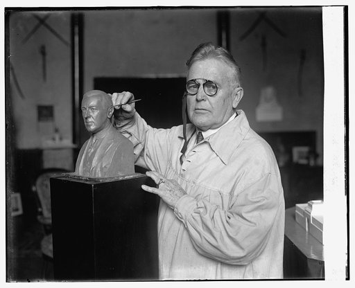 W. Clark Noble with bust of Woodrow Wilson, [12/22/24
