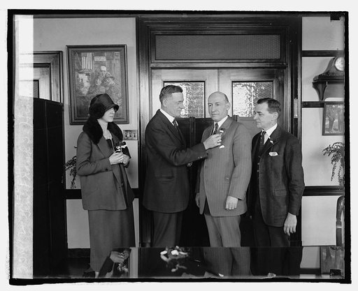Gen. Frank J. Hines receiving poppy