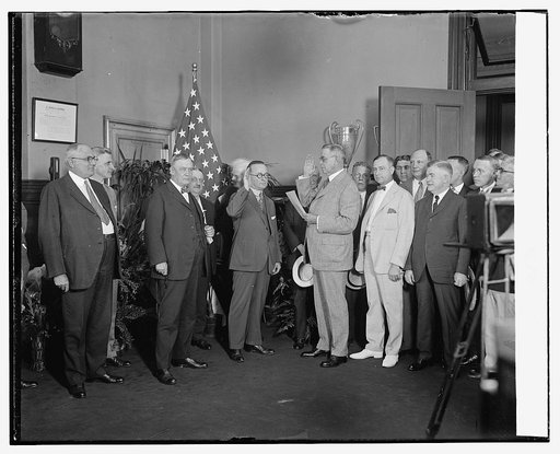 Hubert Work swearing in M.J. Glover as 2nd Asst. P.M.G., 8/1/25