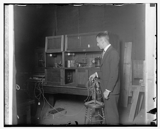 Phillip P. Quayle photographing bullets, Bu. of Standards, 8/17/25