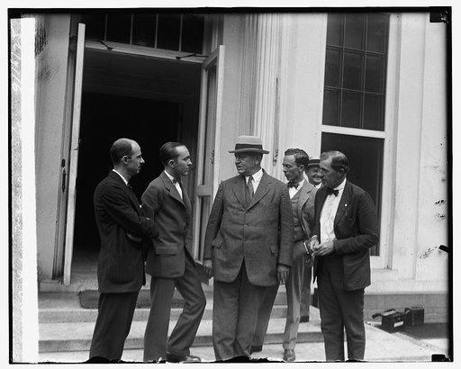 Edwin Denby with newspapermen, 9/16/25