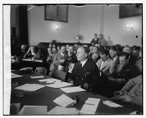 Commander John Rogers before special aviation board
