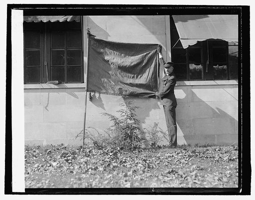 Howard S. Fisk with flag of Geo. Wash. Post. Amer. Leg., 10/20/25