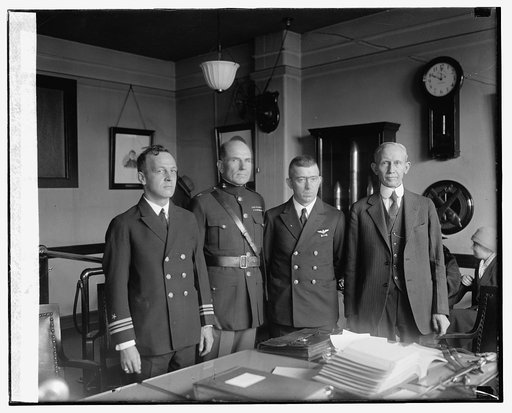 Lt. Com. M.R. Pierce, Maj. H. Leonard, Lt. Com. R.G. Pennoyer, Prof. M. Hovgaard