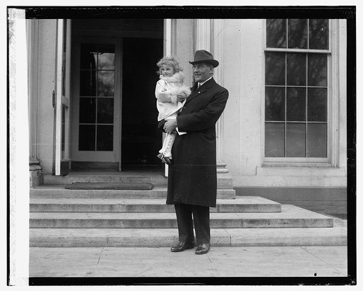 Sec. Wilbur with Carolyn Hill who enrolled him in Red Cross, 11/17/25