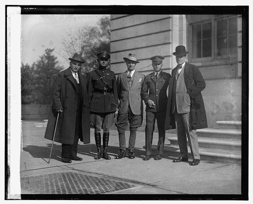 Joseph Davies, Capt. Lowell Smith, Col. Mitchell, Maj. Bellings, Rep. Reid, 11/21/25