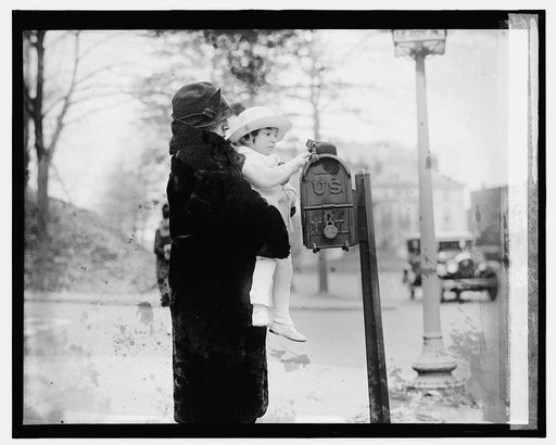 Madam & John Sirmopoulos mailing letter to Santa