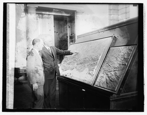 Henford MacNider & Gen. H.E. Ely with relief map, 2/17/26