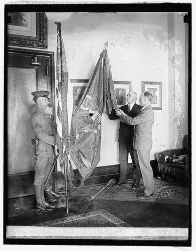 Gen. H.E. Ely & Hanford MacNider with their service flags, 2/17/26