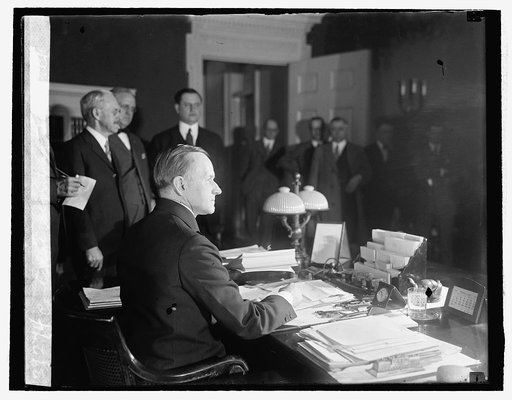 Coolidge signing tax bill, [2/26/26