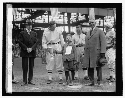Johnson receiving cup from Edwin Marshall, 4/13/26