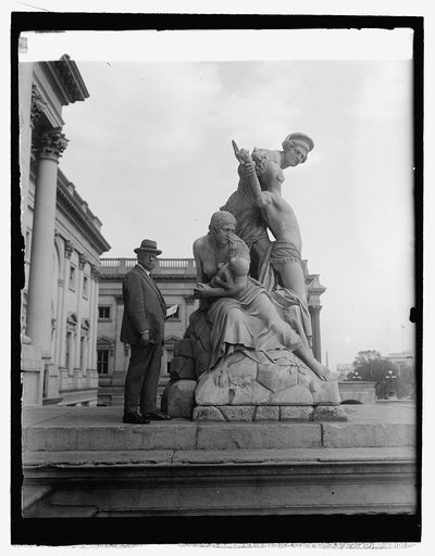 Chas. E. Fairman with rescue statue at Capitol, 4/26/27 [i.e., 4/26/26?