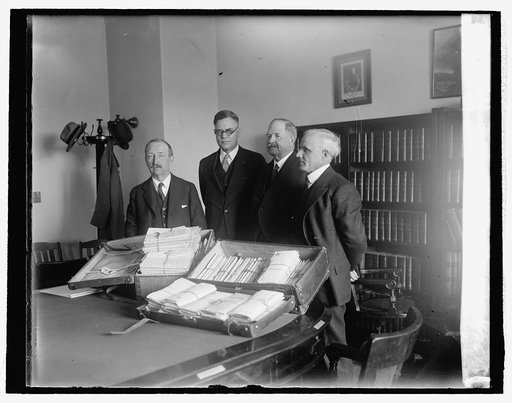 Group with veterans papers in lunacy cases at Capitol, 4/26/26