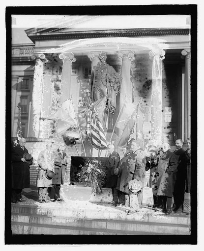 Mellon placing wreath on statue of Alexander Hamilton, 1/11/27