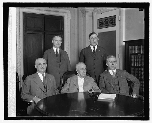 Theo. Stitts & Col. J.V. Climie (standing), Sen. R.W. Means, Jas. Tanner, Howard P. Savage, 2/18/27