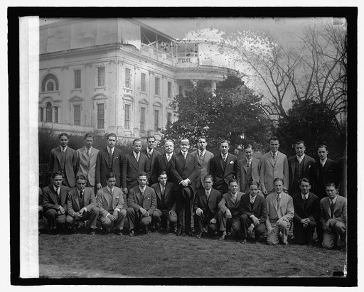 Coolidge and unidentified group on White House lawn