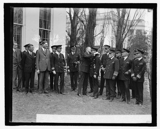 Coolidge confers Cong. Medal on Comdr. Byrd & machinists flag of Bennett, 3/19/27