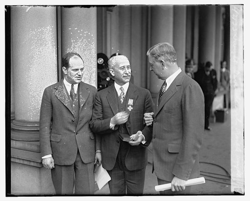 Dwight Davis decorating Orville Wright, [2/27/29
