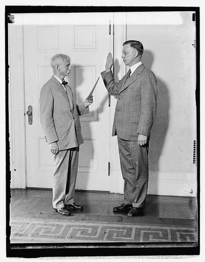 N.P. Webster swearing in Walter P. Newton, 7/1/29