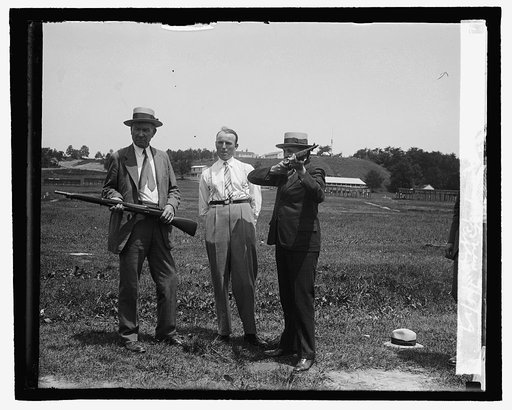 Genl. Simmons inspecting new rifile, 7/2/29