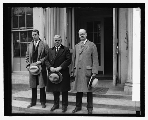 Secty. Davis with Robert Webster Jones & son Ed. Phil Ledger, 11/9/29