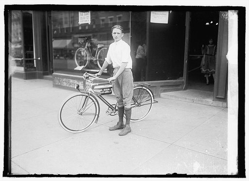 T[...] boy on bicycle