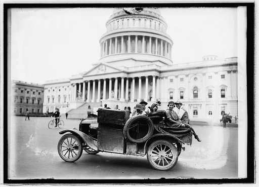 Women and dog in car in front of Capitol building], 9/21/21
