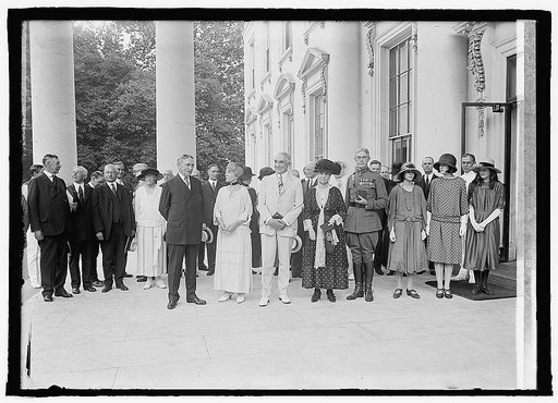 President and Mrs. Harding and group at White House, Washington, D.C.], 6/15/1923