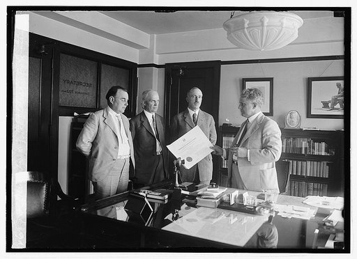 Davis handing H.A. Curran his commission, 6/16/23