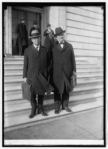 Geo. E. Chamberlain & Paul Howland