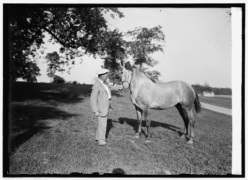 Sec. Wallace at Beltsville, [Md.], farm with 2-year old colt, 8/18/24