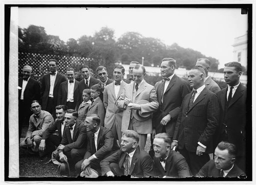 Pres. Coolidge autographing ball for Walter Johnson, 9/5/24