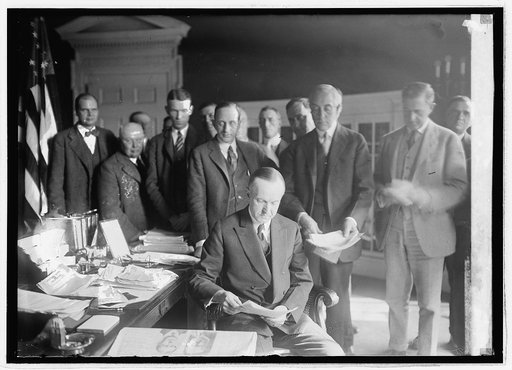 Pres. Coolidge with [newspaper men?], [11/24