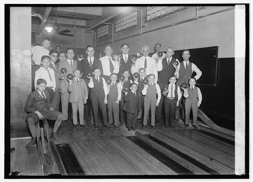 Singer midgets bowling at Y.M.C.A.