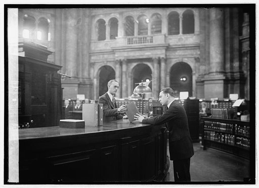 Cong. McLeod at Cong. Library [Washington, D.C.] with Mr. Lincoln of L.C. staff