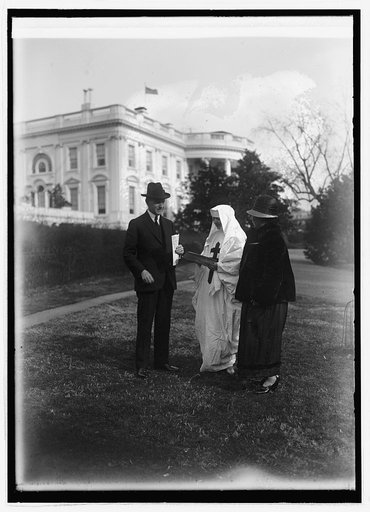 Pres. Coolidge buys tuberculosis seals, 12/1/24