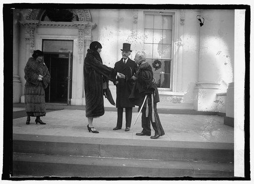 Sec. Mellon & Miss Alsia Mellon and Gen. Clem at New Year reception, [White House, Washington, D.C.], 1/1/25