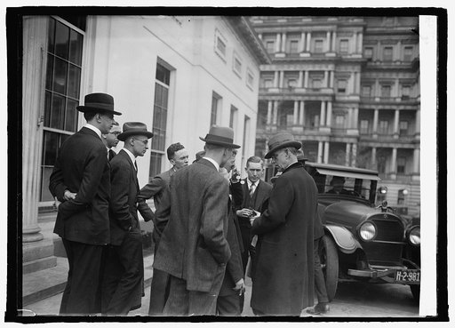 Senator Reed Smoot with newspapermen at W.H. [i.e., White House, Washington, D.C.], 3/11/25
