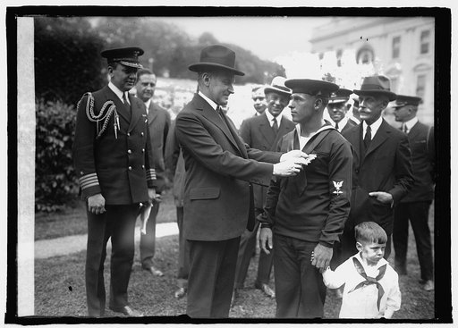 Coolidge decorating aviation chief mach. mate Augustus Butler Rowland, [4/29/25