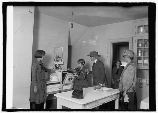 Mrs. Herbert Hoover at Girl Scouts' little house, 5/16/25