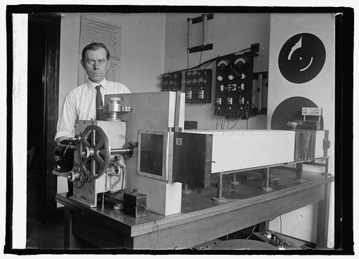 R. Davis of Bu. of Standards with camera for testing photographic materials, [6/16/25