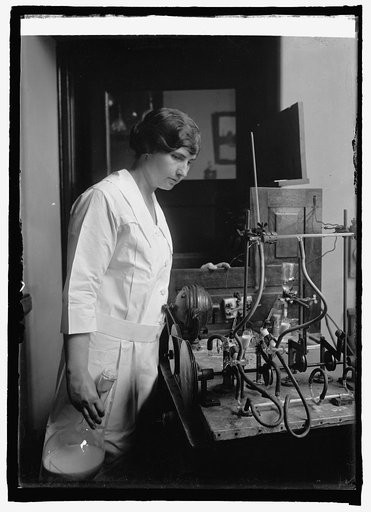 Miss Anne Benton of Dept. of Ag. testing evaporated milk, 6/27/25