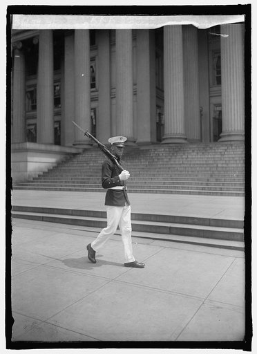 Marine guarding Treasury during KKK Parade, [8/7/25