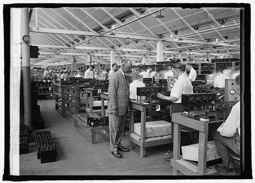 Atwater Kent at test table, Philadelphia, [Pennsylvania] factory