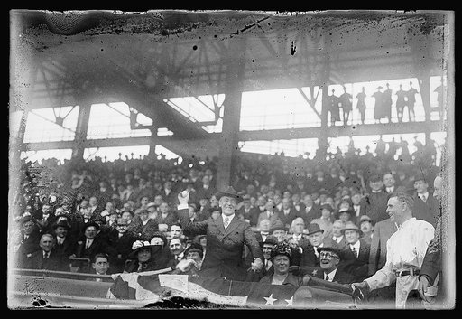 Pres. Wilson throwing out 1st ball, opening ballgame, 1916, Wash., D.C.